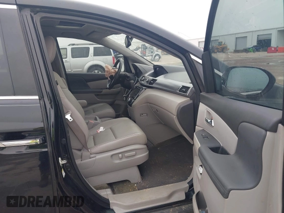 2014 Honda Odyssey EX-L with VIN 5FNRL5H64EB114709, listed as a IAAI auction lot 42131146 with 145,616 mi miles and . Bid and sale history available at DreamBid. Image 5.