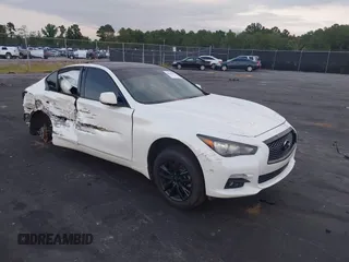 2014 Infiniti Q50 Premium with VIN JN1BV7AP3EM681742, listed as a IAAI auction lot 40342929 with 136,412 mi miles. Bid and sale history available at carsss.com. Image 1.