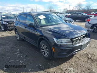 2018 Volkswagen Tiguan S with VIN 3VV0B7AX0JM124154, listed as a IAAI auction lot 41498165 with 54,592 mi miles and . Bid and sale history available at DreamBid. Image 1.