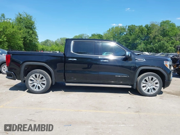 2021 GMC Sierra 1500 Denali with VIN 1GTU9FEL4MZ253708, listed as a IAAI auction lot 42209839 with 52,279 mi miles and . Bid and sale history available at DreamBid. Image 13.