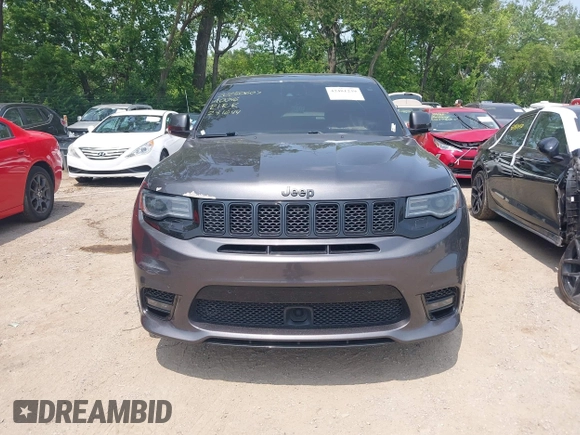 2018 Jeep Grand Cherokee SRT z VIN 1C4RJFDJ7JC281644, wystawiony jako IAAI lot #42481239 z przebiegiem 160 218 mil mil oraz . Historia ofert i sprzedaży dostępna na DreamBid. Obrazek 12.