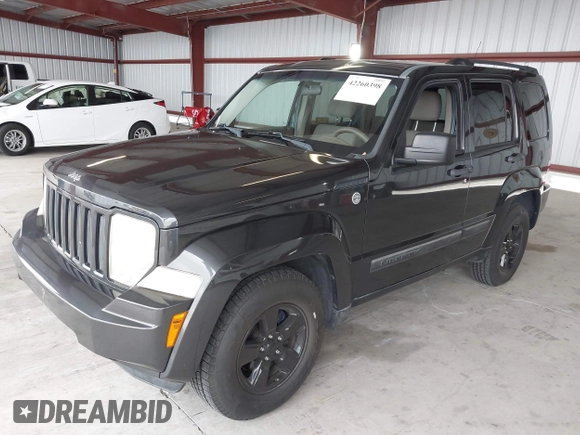 2011 Jeep Liberty Sport with VIN 1J4PN2GK8BW557672, listed as a IAAI auction lot 42260398 with 148,288 mi miles and . Bid and sale history available at DreamBid. Image 2.