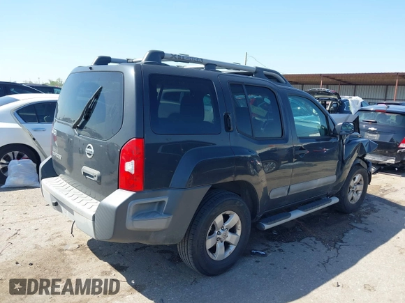 2012 Nissan Xterra X with VIN 5N1AN0NU8CC523668, listed as a IAAI auction lot 41821919 with 243,035 mi miles and . Bid and sale history available at DreamBid. Image 4.