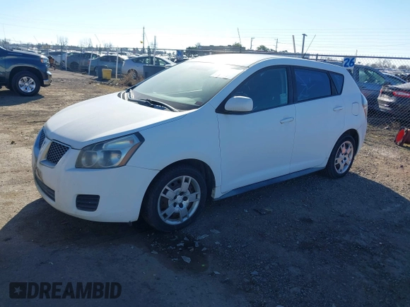 2010 Pontiac Vibe w/1SB with VIN 5Y2SP6E05AZ412346, listed as a IAAI auction lot 41422183 with 135,601 mi miles. Bid and sale history available at carsss.com. Image 2.