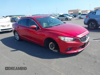 2016 Mazda Mazda6 i Sport with VIN JM1GJ1U55G1436032, listed as a IAAI auction lot 41547828 with 114,637 mi miles. Bid and sale history available at carsss.com. Image 1.