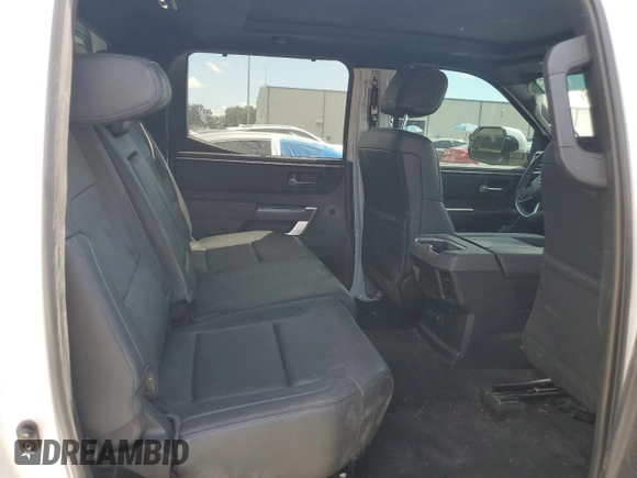 2023 Toyota Tundra Platinum with VIN 5TFNA5DB6PX097041, listed as a Copart auction lot 61903835 with 34,547 mi miles and Salvage title. Bid and sale history available at DreamBid. Image 11.