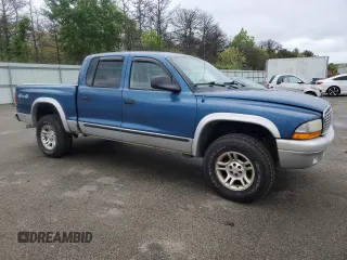 2004 Dodge Dakota SLT z VIN 1D7HG48K04S739865, wystawiony jako Copart lot #57867265 z przebiegiem 214 698 mil mil oraz Tytuł czysty. Historia ofert i sprzedaży dostępna na DreamBid. Obrazek 4.