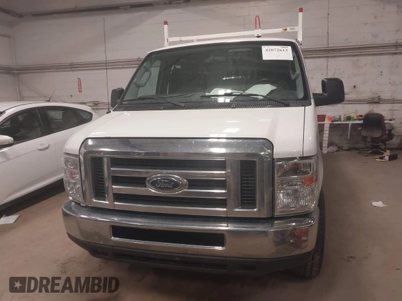 2012 Ford Econoline Cargo Recreational with VIN 1FTNE2EW4CDB03757, listed as a IAAI auction lot 42072612 with 147,153 mi miles. Bid and sale history available at carsss.com. Image 12.