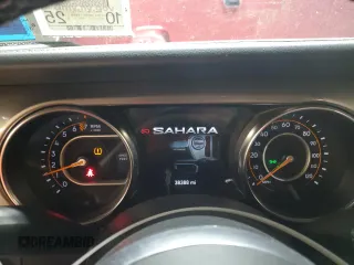 2021 Jeep Wrangler Unlimited Sahara z VIN 1C4HJXEGXMW758252, wystawiony jako Copart lot #50489015 z przebiegiem 38 388 mil mil oraz Szkoda całkowita • Salvage title. Historia ofert i sprzedaży dostępna na DreamBid. Obrazek 9.