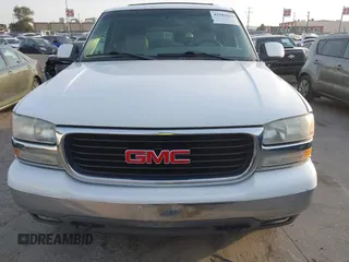 2001 GMC Yukon SLT with VIN 1GKEK13T41R171024, listed as a IAAI auction lot 41582633 with 216,077 mi miles. Bid and sale history available at carsss.com. Image 6.