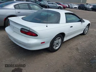 1994 Chevrolet Camaro z VIN 2G1FP22S5R2173095, wystawiony jako IAAI lot #42427396 z przebiegiem 95 713 mil mil oraz . Historia ofert i sprzedaży dostępna na DreamBid. Obrazek 4.