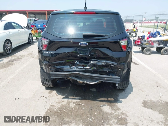 2018 Ford Escape S with VIN 1FMCU0F78JUB60610, listed as a IAAI auction lot 42447952 with 112,184 mi miles and . Bid and sale history available at DreamBid. Image 6.