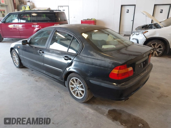 2004 BMW 3 Series 325i with VIN WBAEV334X4KL63050, listed as a IAAI auction lot 42117698 with 173,687 mi miles. Bid and sale history available at carsss.com. Image 3.
