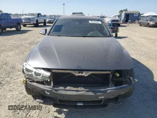 2018 BMW 3 Series 330i with VIN WBA8B9G54JNU95856, listed as a Copart auction lot 58526465 with 93,746 mi miles and Salvage title. Bid and sale history available at DreamBid. Image 5.