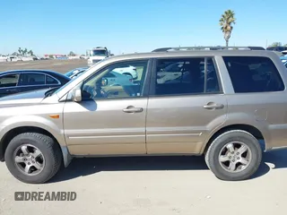 2006 Honda Pilot EX with VIN 5FNYF28416B017534, listed as a IAAI auction lot 41656789 with 241,343 mi miles and . Bid and sale history available at DreamBid. Image 14.