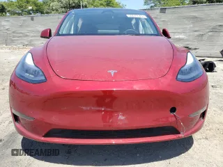 2024 Tesla Model Y Long Range with VIN 7SAYGDEE8RA233147, listed as a Copart auction lot 56695545 with 9,512 mi miles and Salvage title. Bid and sale history available at DreamBid. Image 5.