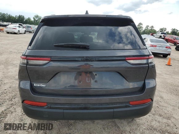 2023 Jeep Grand Cherokee Altitude with VIN 1C4RJGAG7PC573429, listed as a Copart auction lot 58052174 with 9,704 mi miles and Salvage title. Bid and sale history available at DreamBid. Image 6.