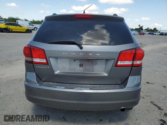 2013 Dodge Journey SE с VIN 3C4PDCAB9DT656887, выставлен на аукционе Copart как лот 54791315 с пробегом 130 394 миль миль и Списание • Salvage title. История ставок и продаж доступна на DreamBid. Изображение 6.