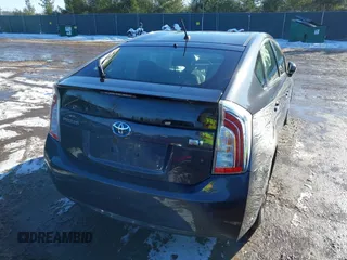 2015 Toyota Prius Four with VIN JTDKN3DU9F1987337, listed as a IAAI auction lot 41329556 with 86,104 mi miles. Bid and sale history available at carsss.com. Image 4.