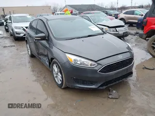 2015 Ford Focus SE with VIN 1FADP3K26FL383355, listed as a IAAI auction lot 41520459 with 142,111 mi miles and . Bid and sale history available at DreamBid. Image 1.