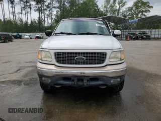 1999 Ford Expedition XLT z VIN 1FMPU18L0XLC10111, wystawiony jako Copart lot #52699205 z przebiegiem Nie podano mil oraz Szkoda całkowita • Salvage title. Historia ofert i sprzedaży dostępna na DreamBid. Obrazek 5.