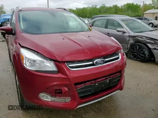 2015 Ford Escape Titanium z VIN 1FMCU0JXXFUA76092, wystawiony jako Copart lot #54824635 z przebiegiem 97 659 mil mil oraz Szkoda całkowita • Salvage title. Historia ofert i sprzedaży dostępna na DreamBid. Obrazek 14.