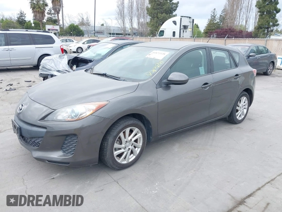 2012 Mazda Mazda3 i Touring with VIN JM1BL1L82C1696088, listed as a IAAI auction lot 41872228 with 111,629 mi miles. Bid and sale history available at carsss.com. Image 2.