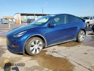 2022 Tesla Model Y Long Range z VIN 7SAYGDEEXNF372693, wystawiony jako Copart lot #53275555 z przebiegiem 51 165 mil mil oraz Szkody całkowita. Historia ofert i sprzedaży dostępna na DreamBid. Obrazek 1.