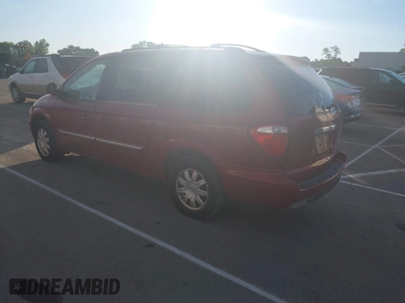 2006 Chrysler Town & Country Touring with VIN 2A4GP54L06R871145, listed as a IAAI auction lot 42199513 with 141,772 mi miles and . Bid and sale history available at DreamBid. Image 3.
