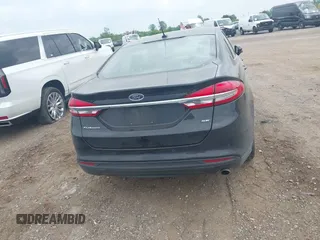 2017 Ford Fusion SE z VIN 3FA6P0H73HR283356, wystawiony jako IAAI lot #42416078 z przebiegiem 52 337 mil mil oraz . Historia ofert i sprzedaży dostępna na DreamBid. Obrazek 16.