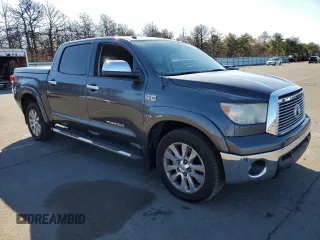 2012 Toyota Tundra 4WD Truck LTD with VIN 5TFHW5F17CX218222, listed as a Copart auction lot 50747405 with 239,853 mi miles and Clean Title. Bid and sale history available at carsss.com. Image 4.