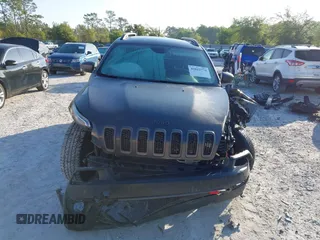 2018 Jeep Cherokee Trailhawk with VIN 1C4PJMBX7JD517299, listed as a IAAI auction lot 42022770 with 62,865 mi miles. Bid and sale history available at carsss.com. Image 13.