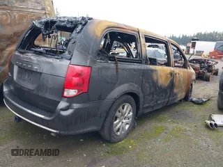2017 Dodge Grand Caravan SE Plus z VIN 2C4RDGBG4HR647372, wystawiony jako IAAI lot #40679801 z przebiegiem Nie podano mil oraz . Historia ofert i sprzedaży dostępna na DreamBid. Obrazek 4.