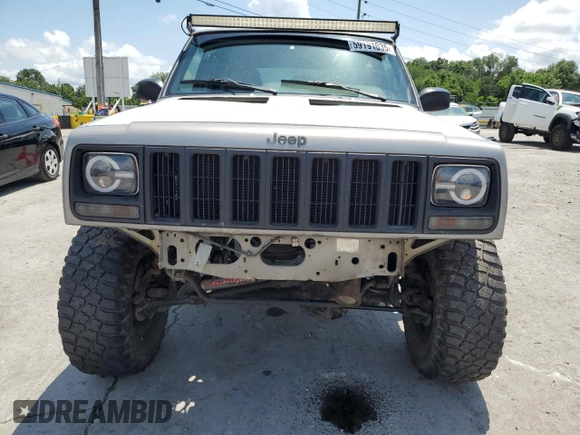 2000 Jeep Cherokee SE with VIN 1J4FF28SXYL140930, listed as a Copart auction lot 59191035 with 248,598 mi miles and Salvage title. Bid and sale history available at DreamBid. Image 5.
