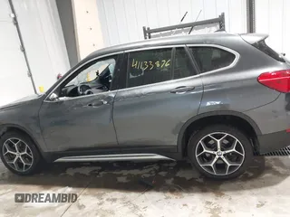 2018 BMW X1 xDrive28i with VIN WBXHT3C38J5L34625, listed as a IAAI auction lot 41133876 with 60,986 mi miles and . Bid and sale history available at DreamBid. Image 14.