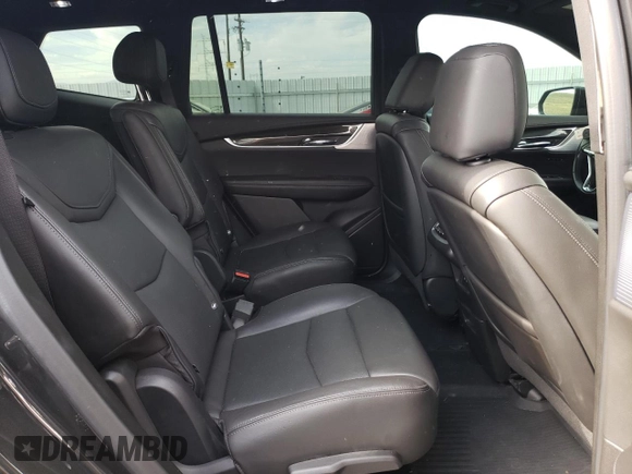 2020 Cadillac XT6 AWD Sport z VIN 1GYKPGRS3LZ109709, wystawiony jako Copart lot #75341924 z przebiegiem 60 420 mil mil oraz Szkoda całkowita • Salvage title. Historia ofert i sprzedaży dostępna na DreamBid. Obrazek 11.