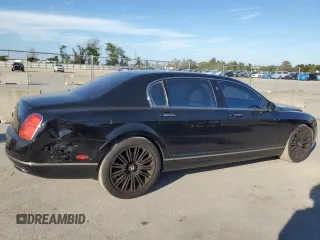 2012 Bentley Flying Spur z VIN SCBBP9ZAXCC076268, wystawiony jako Copart lot #77854304 z przebiegiem 99 103 mil mil oraz Czysty tytuł • Clean title. Historia ofert i sprzedaży dostępna na DreamBid. Obrazek 3.