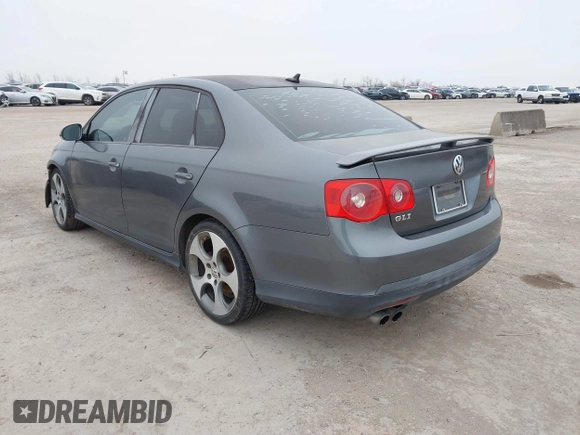 2007 Volkswagen Jetta Sedan GLI 2.0L Turbo with VIN 3VWXJ71K57M095261, listed as a IAAI auction lot 41495424 with 246,772 mi miles. Bid and sale history available at carsss.com. Image 3.