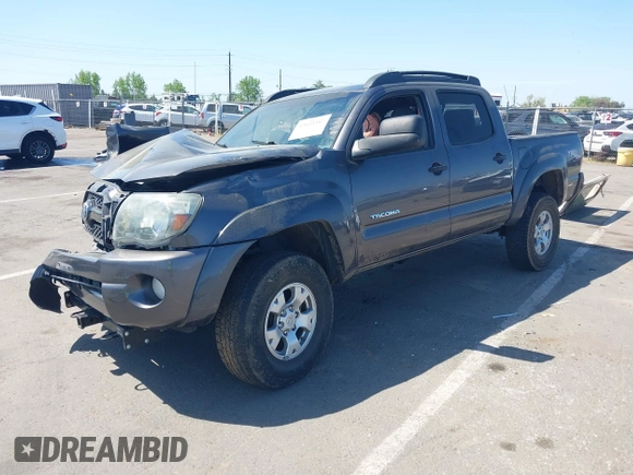 2011 Toyota Tacoma with VIN 5TFLU4EN6BX008627, listed as a IAAI auction lot 42033587 with 179,083 mi miles. Bid and sale history available at carsss.com. Image 2.