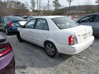 2000 Mazda Protege DX with VIN JM1BJ2221Y0208156, listed as a IAAI auction lot 41609657 with 435,304 mi miles and . Bid and sale history available at DreamBid. Image 3.