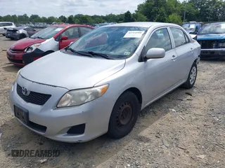 2009 Toyota Corolla with VIN 1NXBU40E89Z128911, listed as a IAAI auction lot 42714988 with 215,416 mi miles and . Bid and sale history available at DreamBid. Image 2.