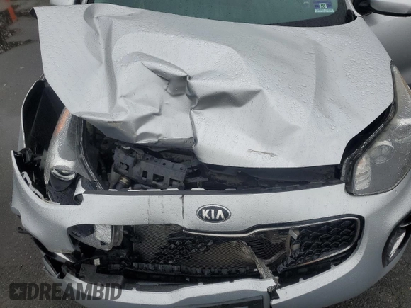 2017 Kia Sportage LX z VIN KNDPMCAC6H7273914, wystawiony jako Copart lot #51964805 z przebiegiem 92 566 mil mil oraz Szkoda całkowita • Salvage title. Historia ofert i sprzedaży dostępna na DreamBid. Obrazek 12.