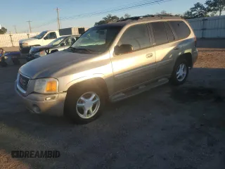 2003 GMC Envoy SLE with VIN 1GKDS13S932170188, listed as a Copart auction lot 82027964 with 266,978 mi miles and Clean Title. Bid and sale history available at carsss.com. Image 1.