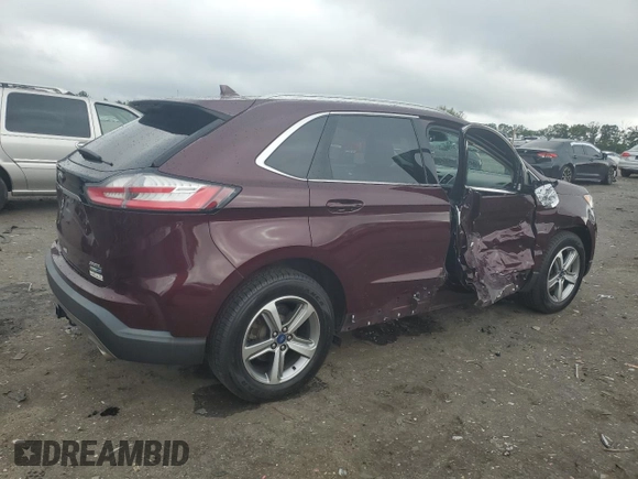 2019 Ford Edge SEL with VIN 2FMPK4J92KBB34891, listed as a Copart auction lot 60050945 with 104,942 mi miles and Salvage title. Bid and sale history available at DreamBid. Image 3.