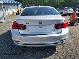 2018 BMW 3 Series 330i xDrive with VIN WBA8D9G50JNU67630, listed as a Copart auction lot 57558615 with 73,784 mi miles and Salvage title. Bid and sale history available at DreamBid. Image 6.