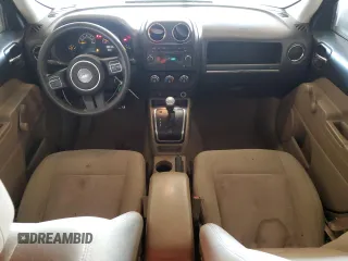 2014 Jeep Patriot Sport z VIN 1C4NJPBB4ED737308, wystawiony jako Copart lot #60673075 z przebiegiem 293 926 mil mil oraz Czysty tytuł • Clean title. Historia ofert i sprzedaży dostępna na DreamBid. Obrazek 8.