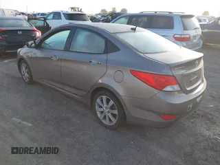 2012 Hyundai Accent GLS with VIN KMHCU4AE4CU097425, listed as a IAAI auction lot 42052740 with 244,705 mi miles. Bid and sale history available at carsss.com. Image 3.