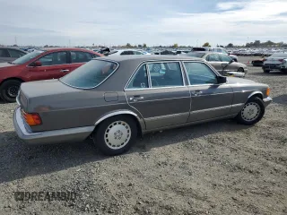 1990 Mercedes-Benz 560 with VIN WDBCA39E3LA553622, listed as a Copart auction lot 81530904 with 142,614 mi miles and Clean Title. Bid and sale history available at DreamBid. Image 3.