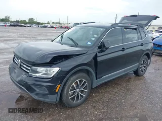 2021 Volkswagen Tiguan SE z VIN 3VV3B7AX7MM004286, wystawiony jako IAAI lot #39864219 z przebiegiem 67 429 mil mil oraz . Historia ofert i sprzedaży dostępna na DreamBid. Obrazek 17.