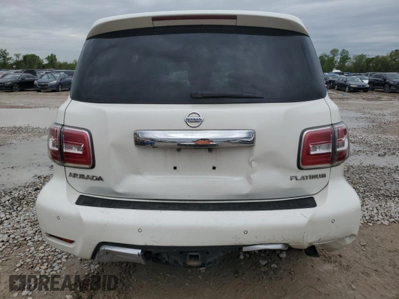 2017 Nissan Armada Platinum z VIN JN8AY2ND4H9003743, wystawiony jako Copart lot #51065965 z przebiegiem 93 801 mil mil oraz Szkoda całkowita • Salvage title. Historia ofert i sprzedaży dostępna na DreamBid. Obrazek 6.